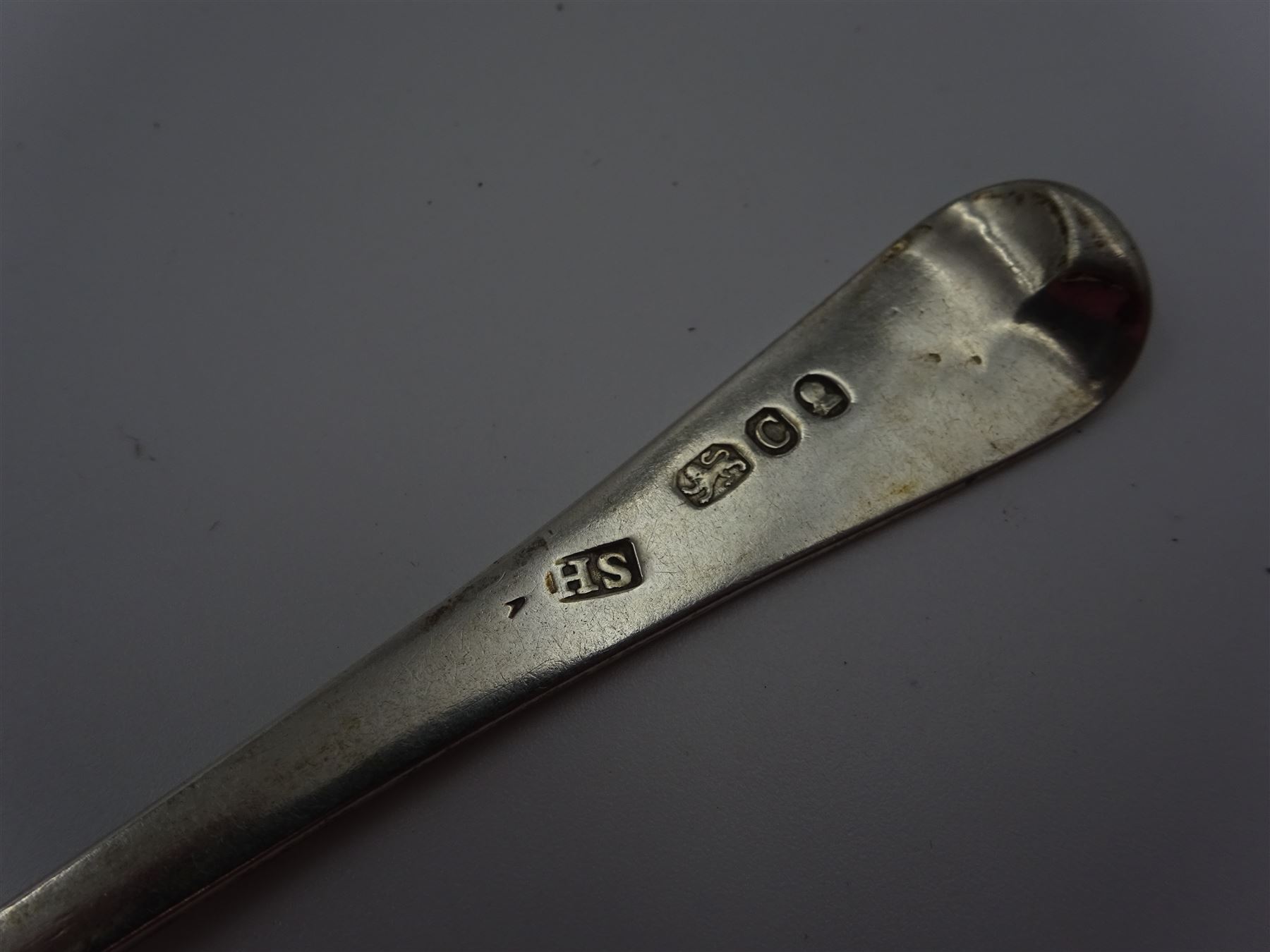 Set of five George III silver Old English pattern teaspoons, each with reed borders and engraved with initial B, hallmarked London 1798, maker's mark HS, together with one very similar George IV silver spoon, hallmarked Richard Britton, London 1826