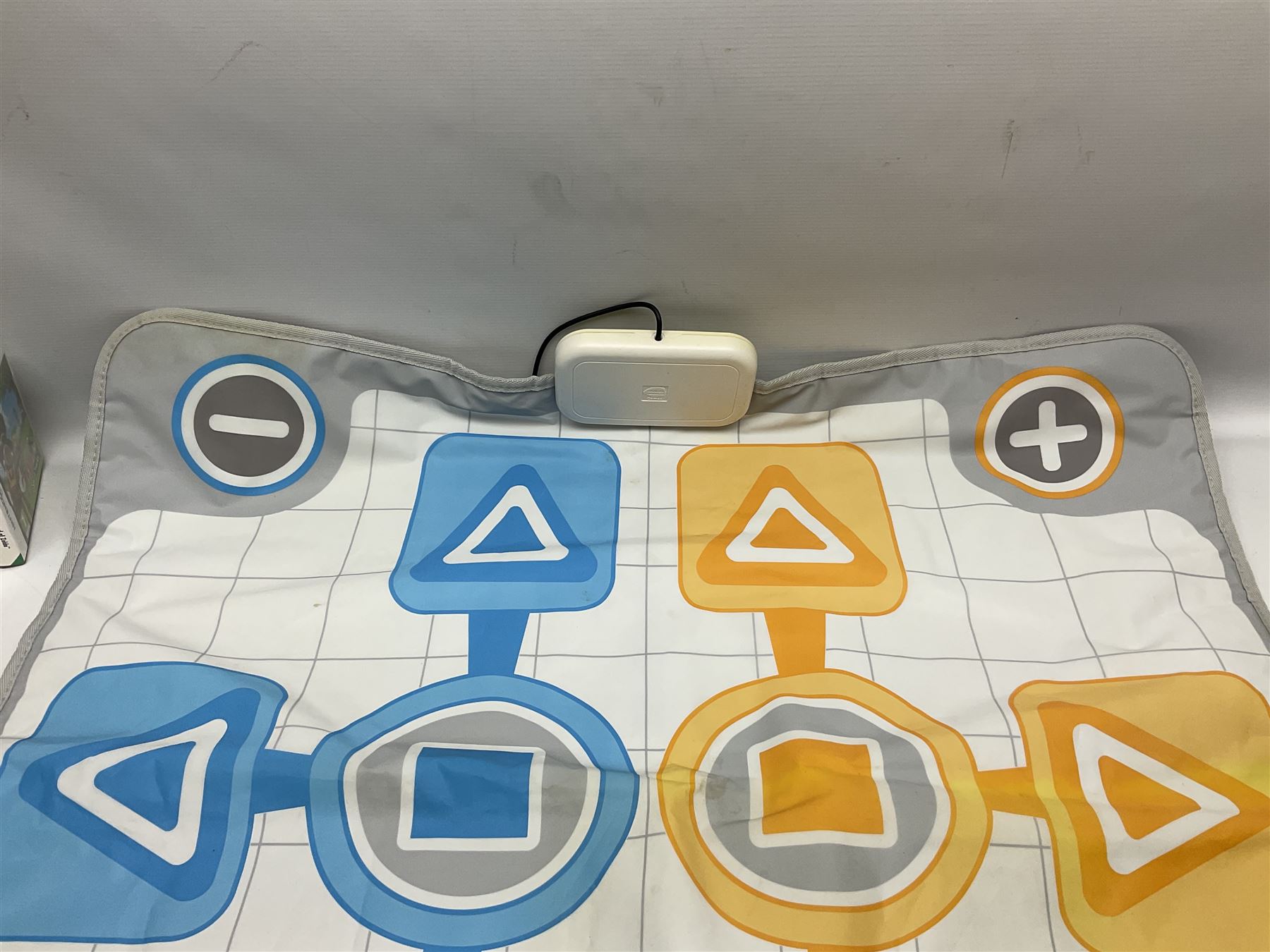 Nintendo Wii console, four controllers with cases and four nunchucks, Wii sensor bar, balance board and dance mat. Guitar hero wireless guitar for Wii and Redoctane wired guitar. Nintendo DS lite handheld gaming console, console and game cases and Guitar Hero Redoctane Guitar Grip. Selection of Nintendo Wii and Nintendo DS lite games to include Super Mario Galaxy, Guitar Hero, Wii Fit, Legend of Zelda games etc. Archos AV400 Series pocket video recorder with accessories, cradle and remote, in three boxes