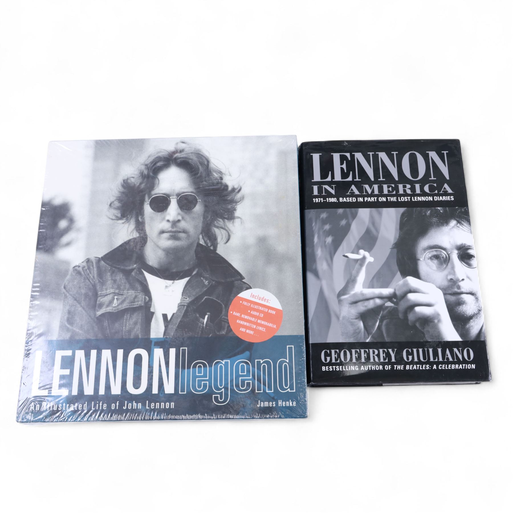 The Beatles memorabilia, including 1964 Fan Club patch, framed with a black and white picture of the band, a further framed black and white picture displayed with Strawberry Fields Forever single, The Beatles Anthology, biographies and other books, two CDs, mug, etc