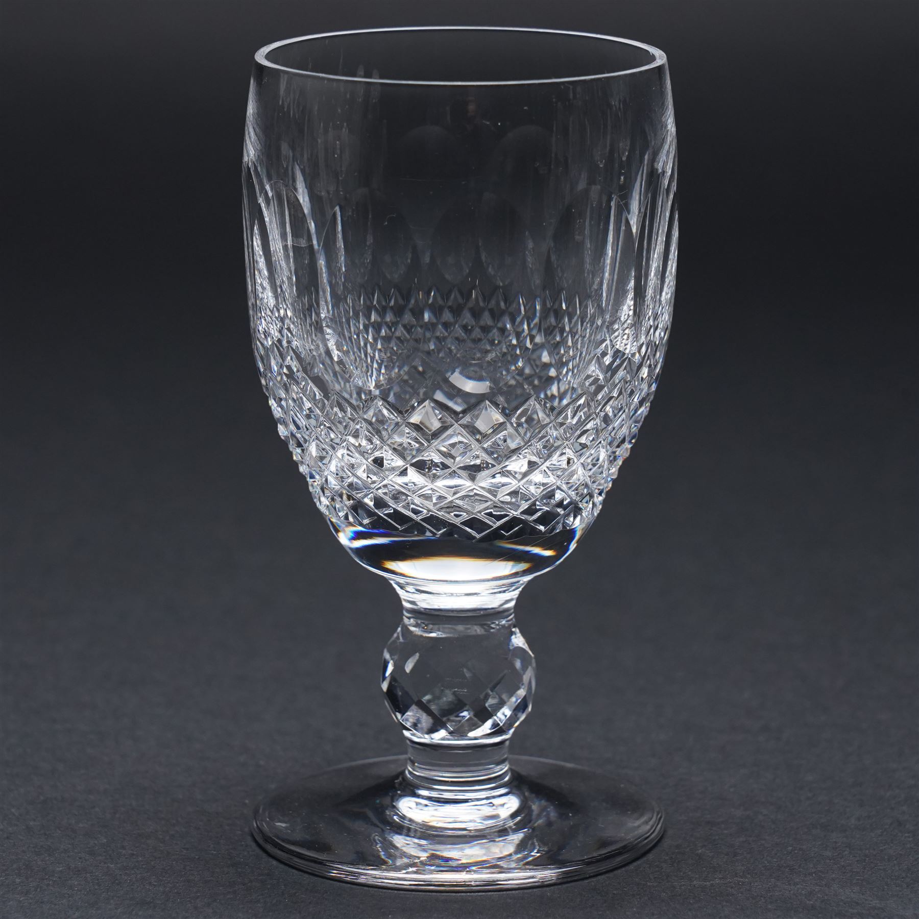 Suite of Waterford Colleen pattern table glass comprising six claret glasses, six hock glasses, six small tumblers, six sherry glasses and two decanters
