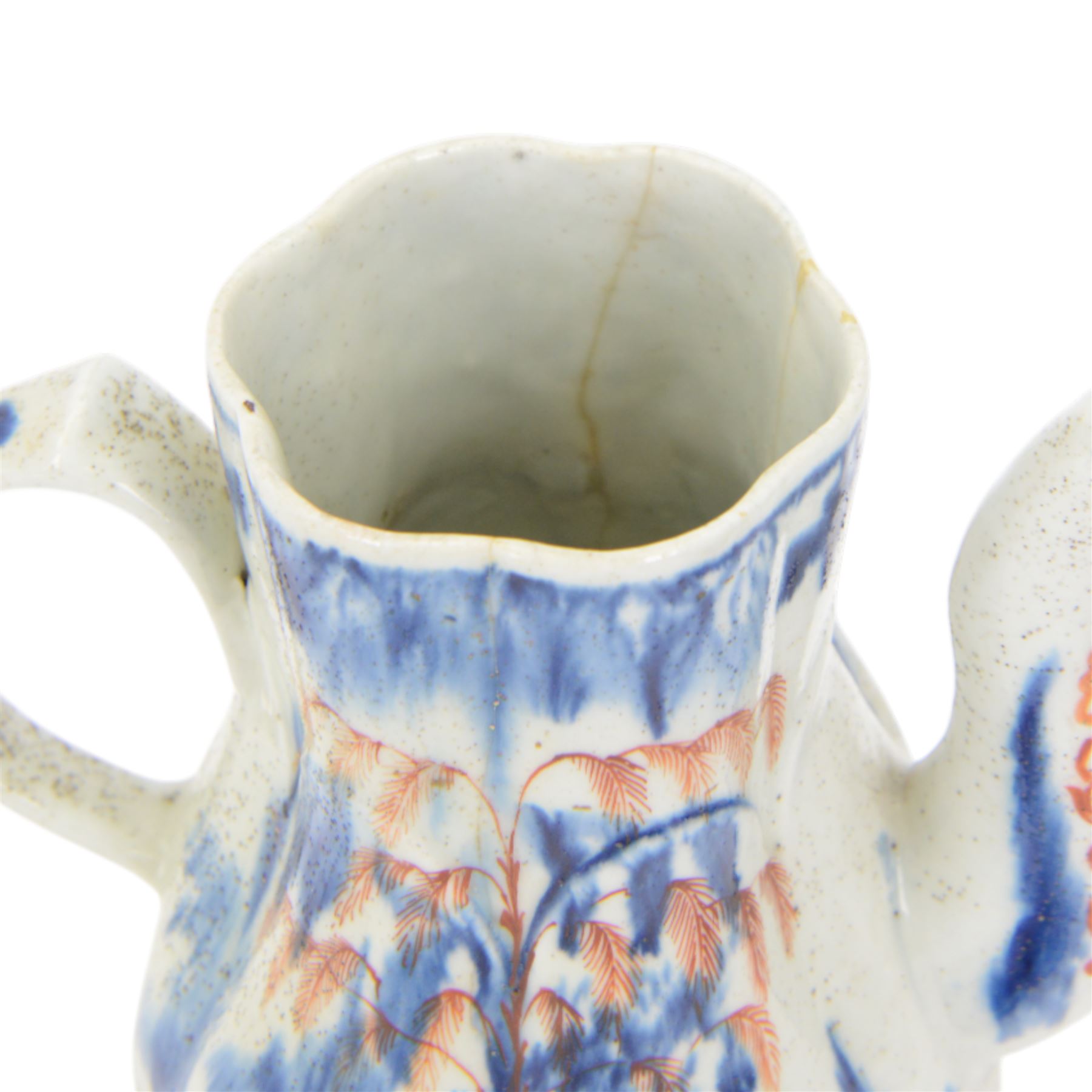 Rare mid 18th century West Pans coffee pot, circa 1764-1770, of baluster form, the moulded six lobed body decorated in underglaze blue with a chinoiserie landscape, picked out in red and green enamel, H26cm