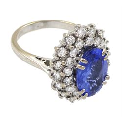 18ct white gold oval sapphire and round brilliant cut diamond cluster ring, Sheffield 2000, sapphire approx 3.75 carat, total diamond weight approx 0.70 carat