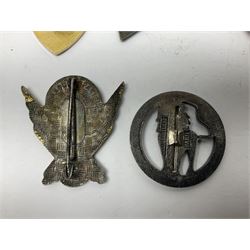 Eleven French Foreign Legion badges including various para, infantry and artillery (some copies)