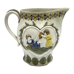 Early 19th century Prattware jug, circa 1800, decorated with two heart shaped panels of children, titled Sportive Innocence and Mischievous Sport, further decorated with acanthus and foliate borders, H22cm