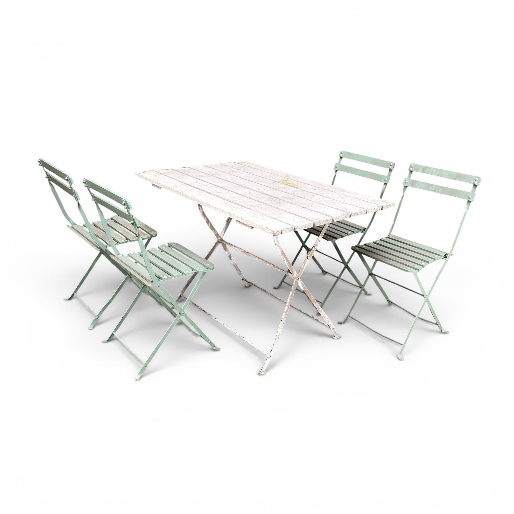 Wrought metal folding garden table, with painted wood plank top; and four matching folding chairs