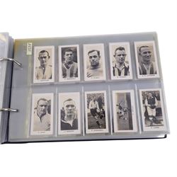 Collection of 1930s and later Football related trading and cigarette cards, including complete set of sixteen 1936 Topical Times Panel Portraits of Star Footballers, collection of further 1930s Footballer Panel Portraits, complete set of twenty-five 1955 The Wizard Famous Footballer cards, complete set of fifty Wills Association Footballers 1935, complete set of fifty Godfrey Phillips International Caps cards, etc, housed in three albums