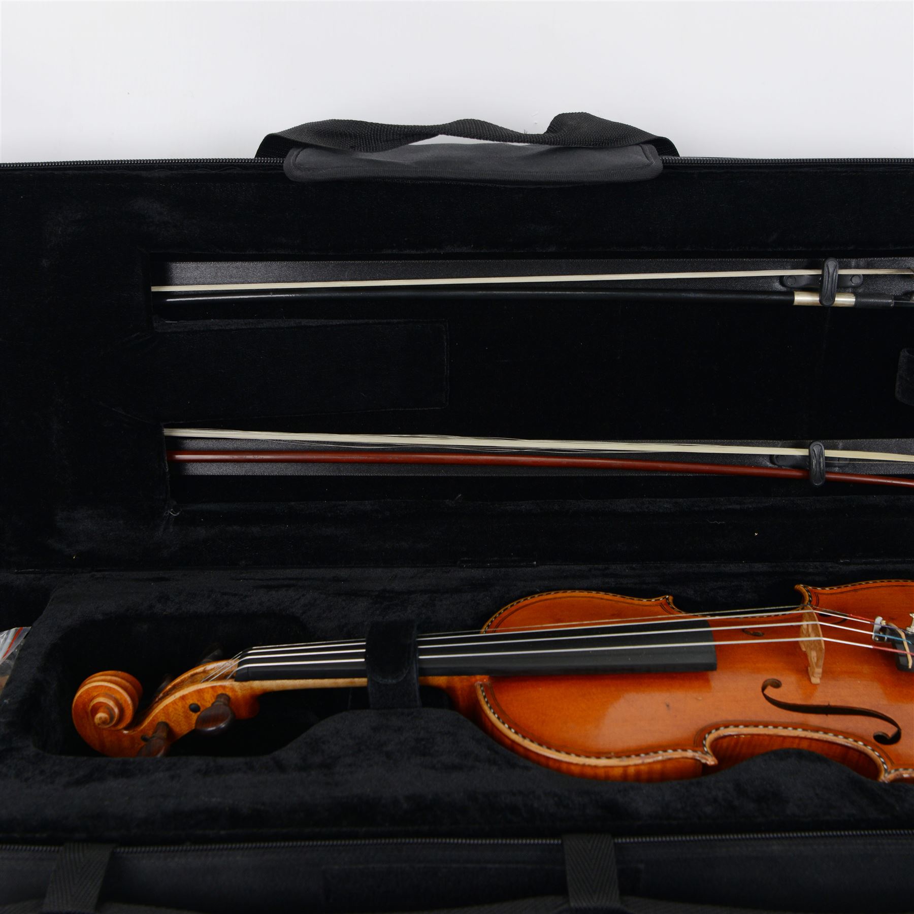 19th century full size European violin, spruce top, figured maple full back and sides, double purfling, in fitted case with two bows.