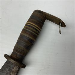 Moroccan jambiya dagger with 24.5cm plain curved blade stamped LONDON to the ricasso area, the hilt and scabbard overlaid with plain sheet brass to the back and ornate silver coloured metal to the front; waisted grip and arched pommel; two pyramid mounts to the scabbard L41cm overall; large billhook with curving blade and stacked leather washer grip; and a reproduction halberd blade (3)