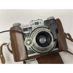 Collection of cameras and lenses, to include Pentax Program A camera body, serial no 123759, with 'Pentax-A zoom 1:3.5-4.5 28-80mm' len, Praktica EE2 camera body with 'Pentacon electric 1.8/50' lens etc, together with a Manfrotto tripod 