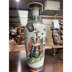 Chinese Kangxi famille verte vase of baluster form with fluted rim, decorated with sage and attendants within a trellis border, with four character Kangxi double ring mark beneath, H31cm 