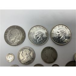 Approximately 65 grams of Great British pre 1920 silver coins and approximately 230 grams of pre 1947 silver coins, including King George V 1935 crown and two King George VI 1937 crowns