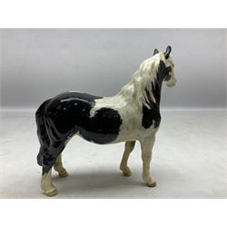Two Beswick figures of horses, comprising Pinto Piebald pony, model no 1373, together with Appaloosa stallion, model no 1772, both designed by Arthur Gredington, both with printed marks beneath
