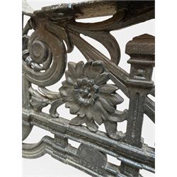 Yates Haywood - pair of Victorian cast iron bench ends, Architectural scrolling design with flower head detail, stamped with period registration number and date