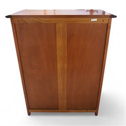 Cherrywood wine rack cabinet, moulded rectangular top over two glazed doors, fitted with eight slides each with three bottle holders inscribed with various wine types, single long drawer to the base 