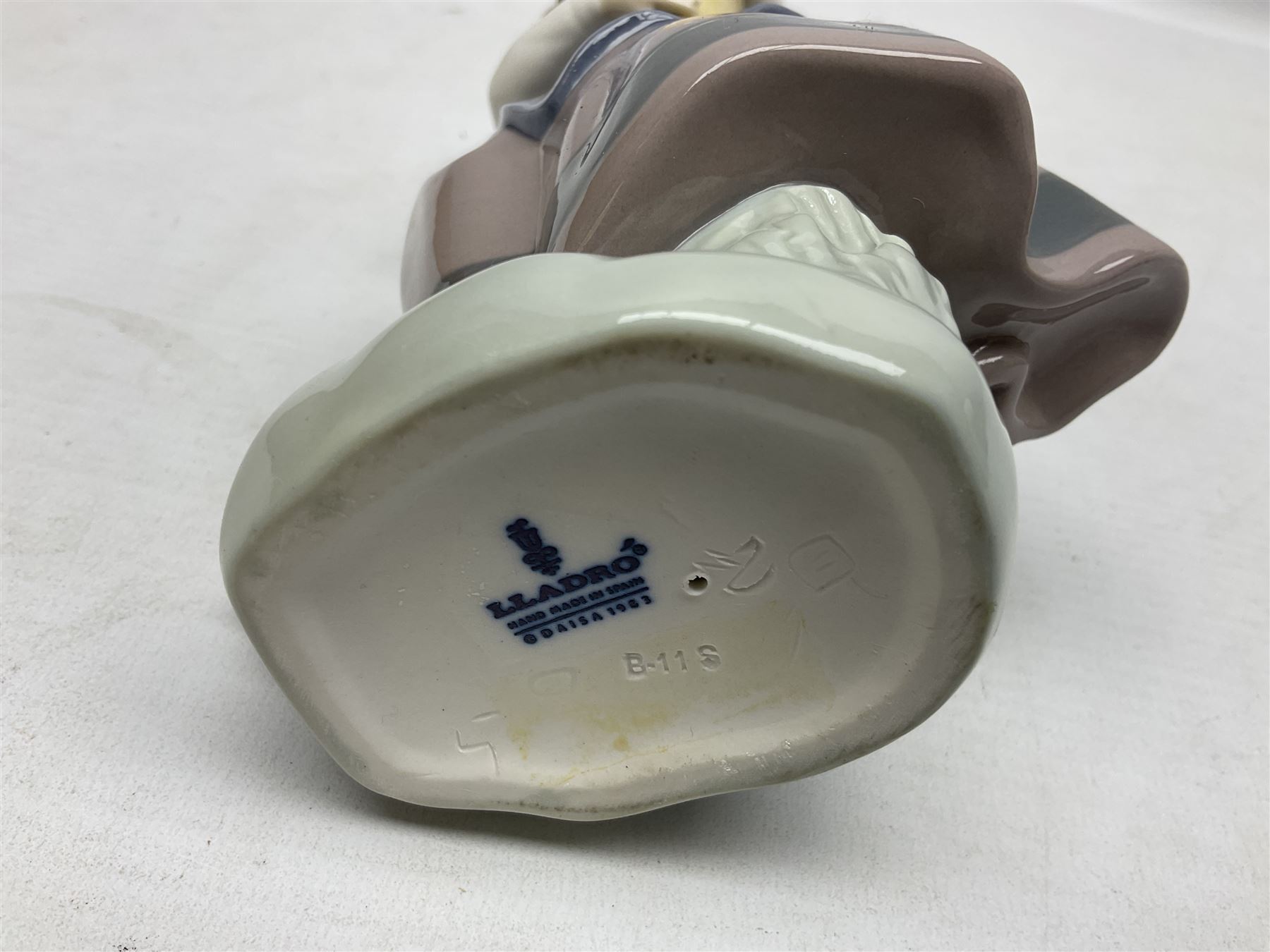 Three Lladro Flower Girls figures, comprising Sweet Scent no 5221, Pretty Pickings no 5222 and Spring is Here no 5223, largest example H18cm 