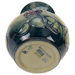 Moorcroft vase in Hypericum pattern, of baluster form, in original box, together with a Moorcroft covered dish in Simeon pattern, both with printed marks beneath, vase H10cm