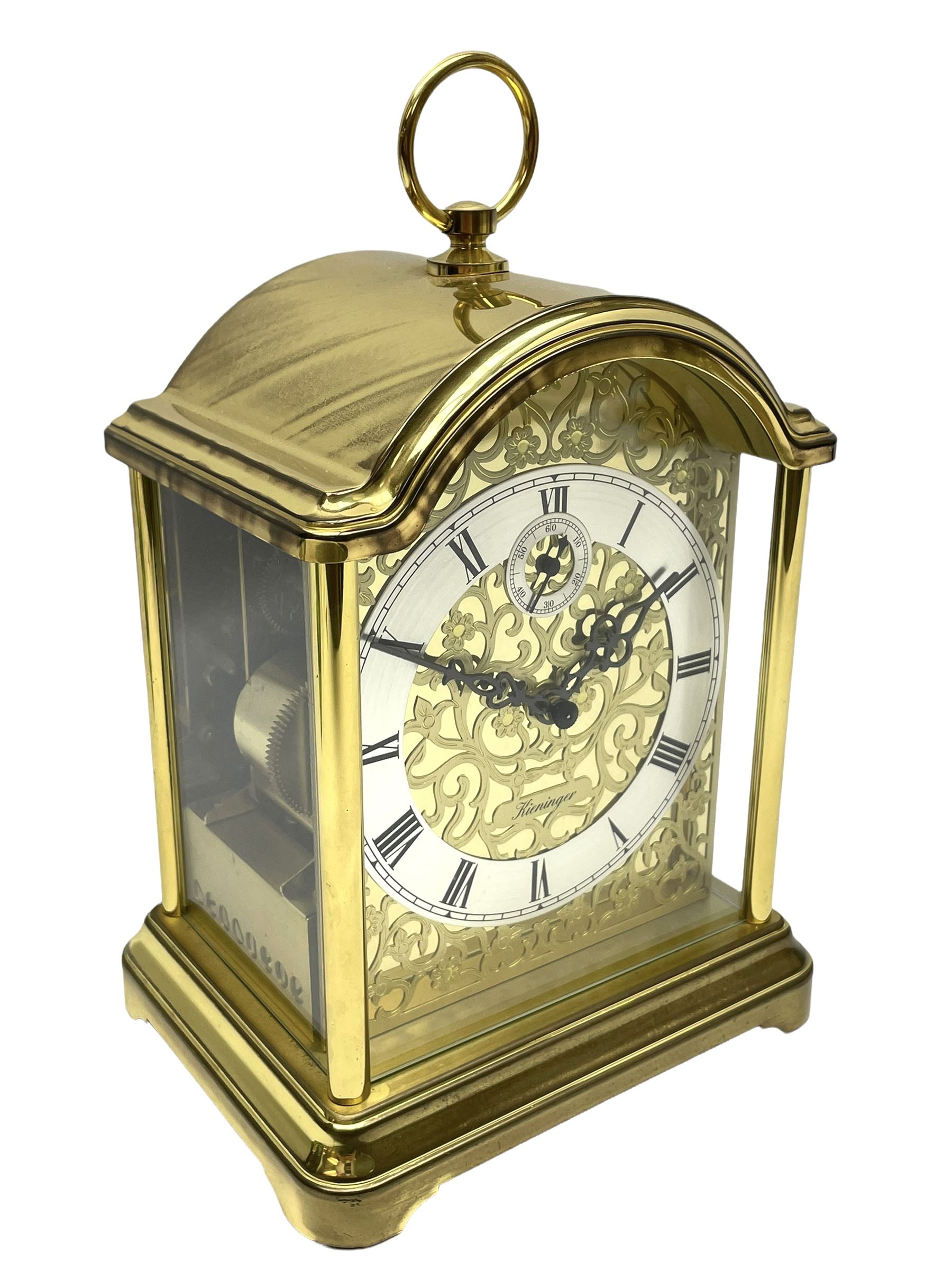 A 20th century brass cased Kieninger (German) chiming mantle clock with