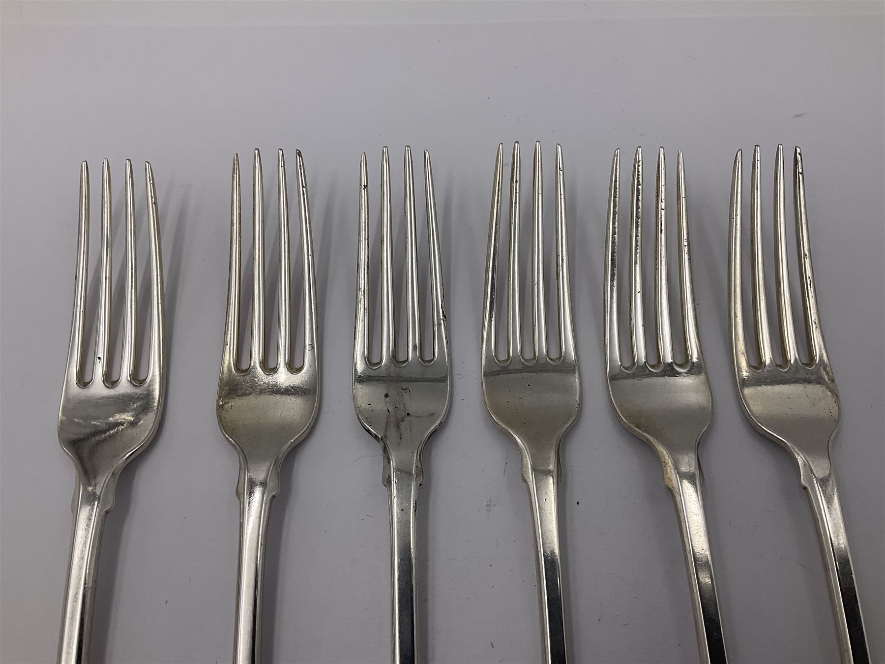 George IV Scottish silver Kings pattern cutlery for six place settings, to include table spoons, table forks, dessert spoons and dessert forks, all engraved with shamrock crest to terminal, hallmarked Robert Gray & Son, Glasgow 1833