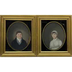 English School (Early 19th century): Husband and Wife, pair oval gouache half length portraits unsigned, family history verso 18cm x 14cm (2)