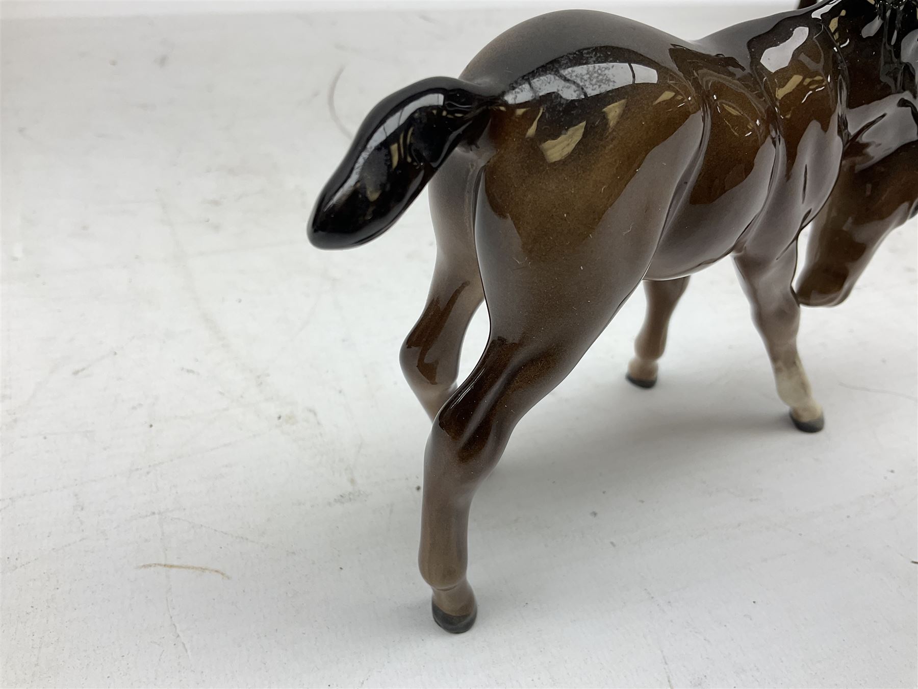 Six Beswick figures of bay horses, including large hunter no.1734, Shire horse no.818, horse with tucked head no.1549, etc (6)