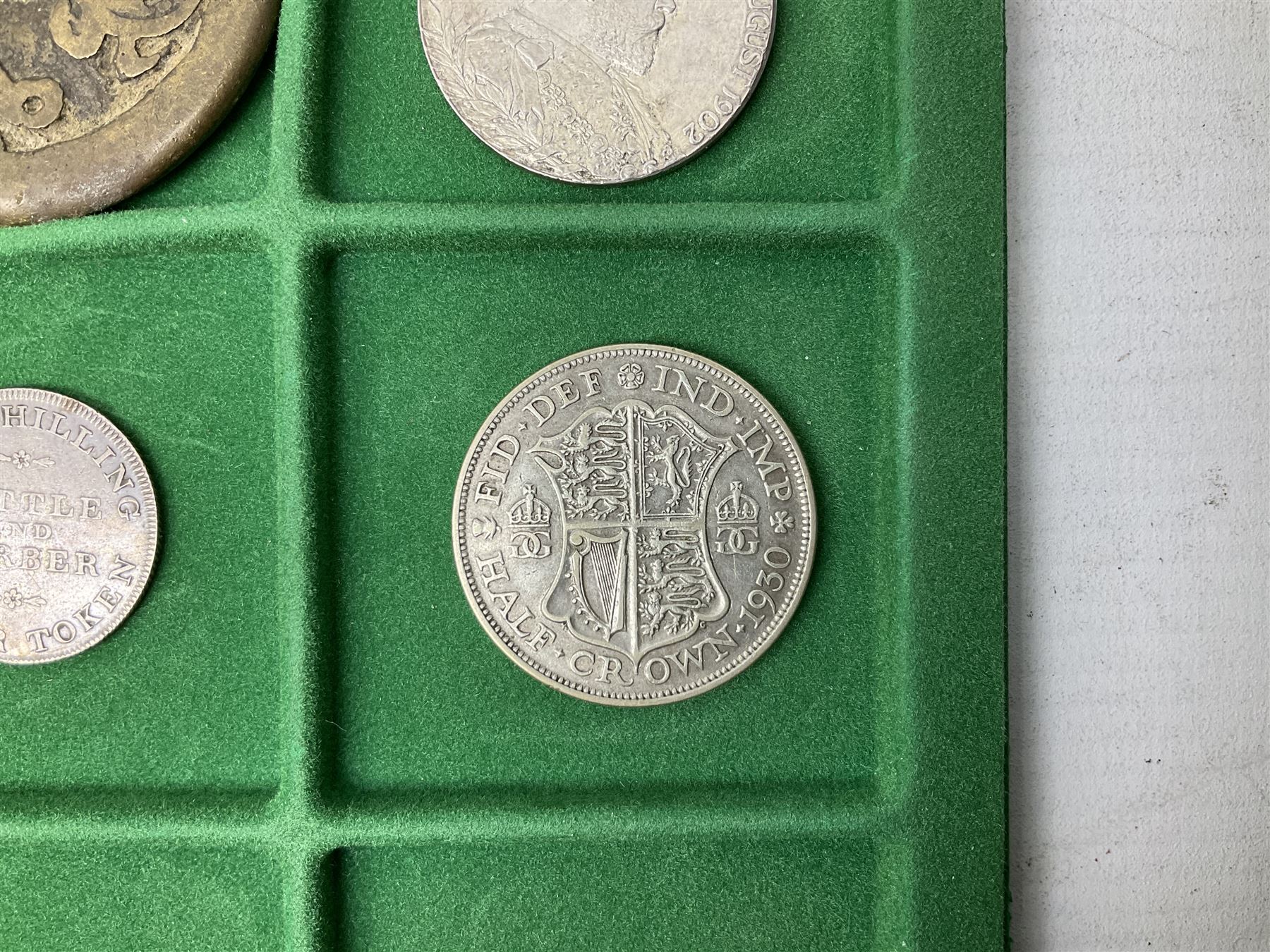 Coins and medallions including, York 1811 one shilling cattle and barber silver token, United States of America 1883O silver Morgan dollar, birds of destiny medal by Malcolm Appleby, Great British King George V 1930 halfcrown, King Edward VII 1902 silver medal, King George V 1916 halfcrown etc, housed in a case with lift out green coin trays