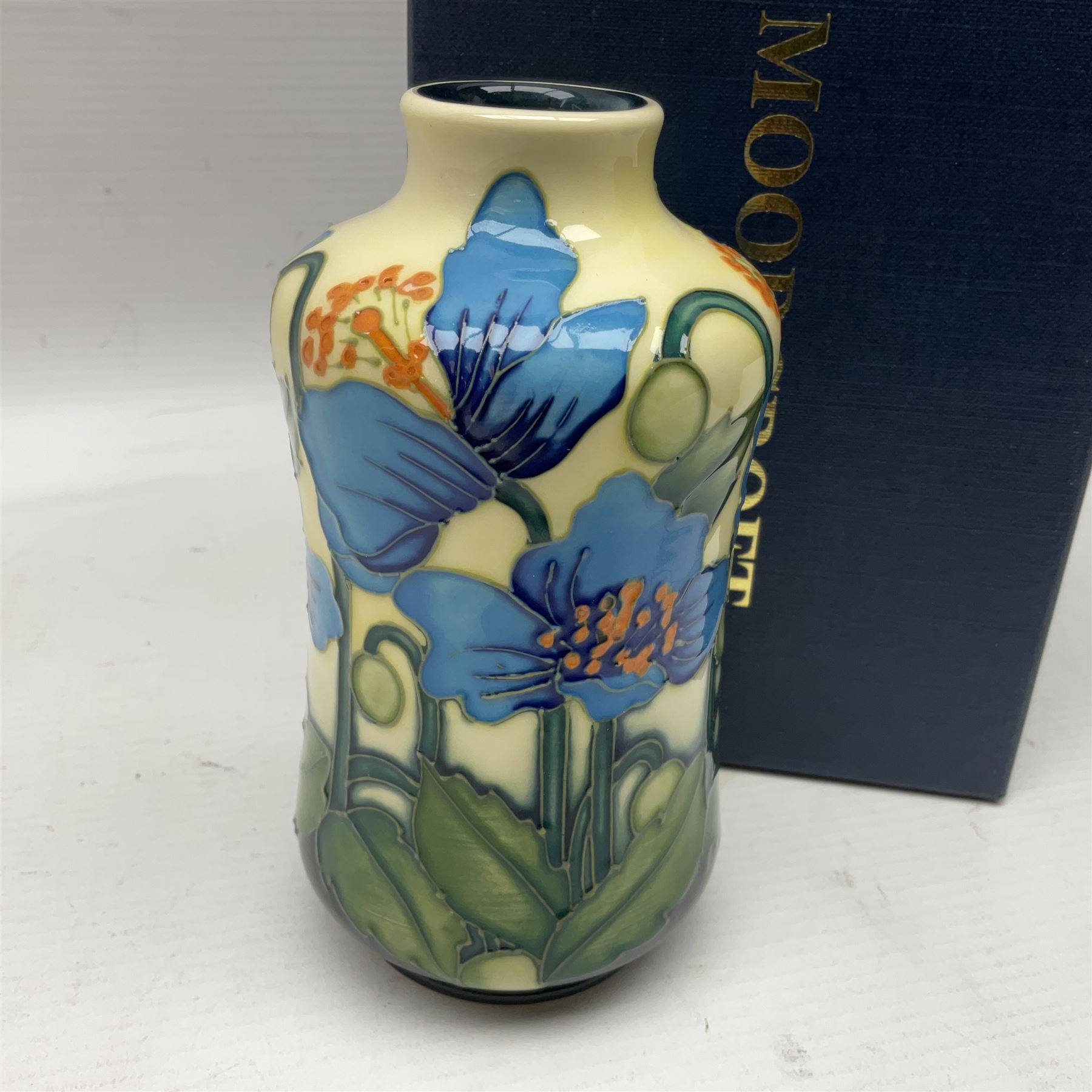 Moorcroft vase, of waisted form, decorated in the Cambrian Blue pattern by Kerry Goodwin, circa 2011, H14cm, with original box 