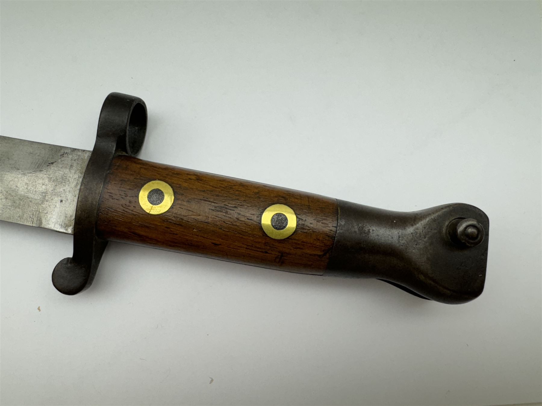 WWII Lee Metford rifle bayonet with original scabbard marked 586, with canvas frog, L44cm overall 
Notes; due to the condition of the bayonet it is possible this was issued to the home guard