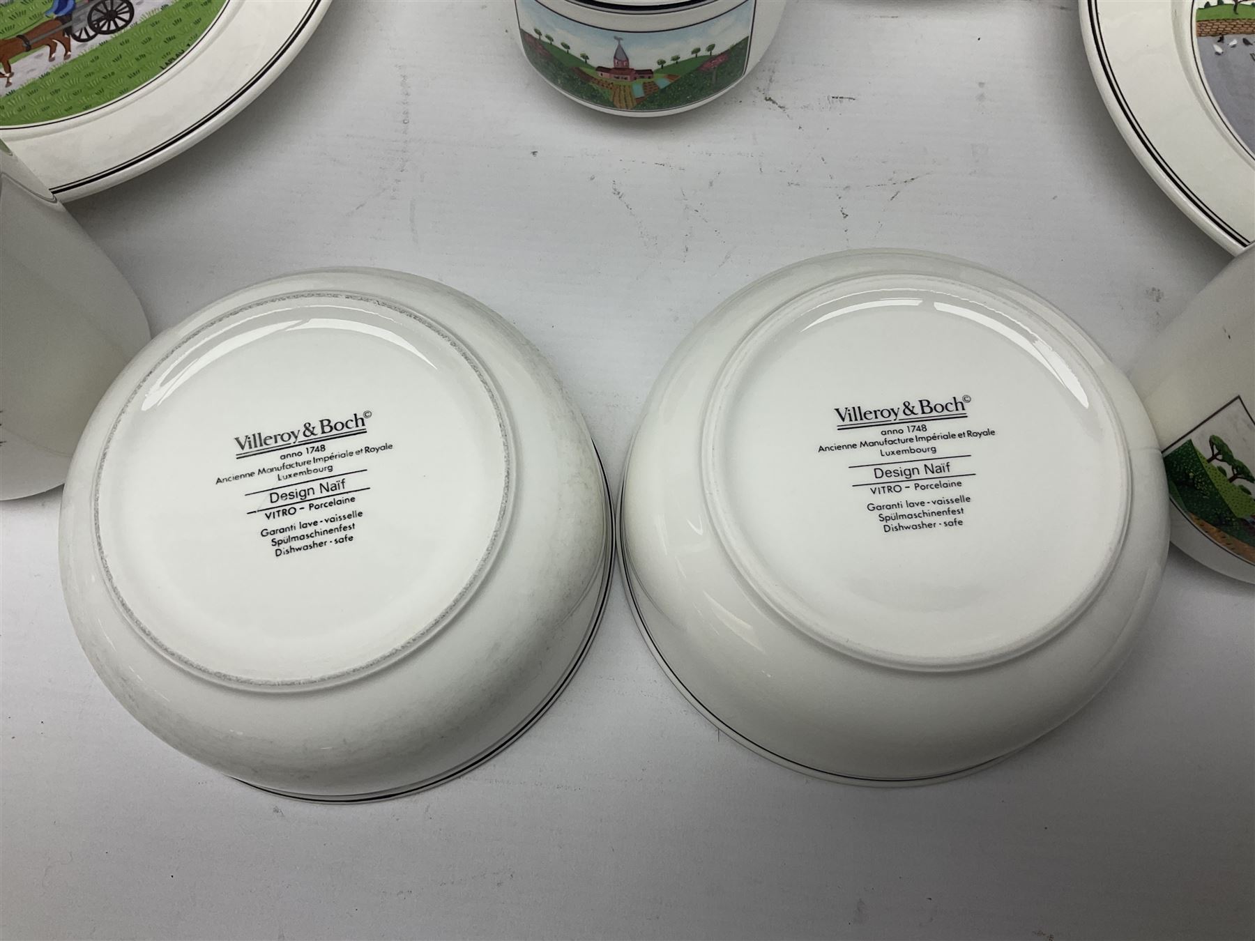 Villeroy and Boch Naif pattern tea service, comprising teapot, jug, covered sucrier, two mugs, two breakfast bowls and four side plates (11)