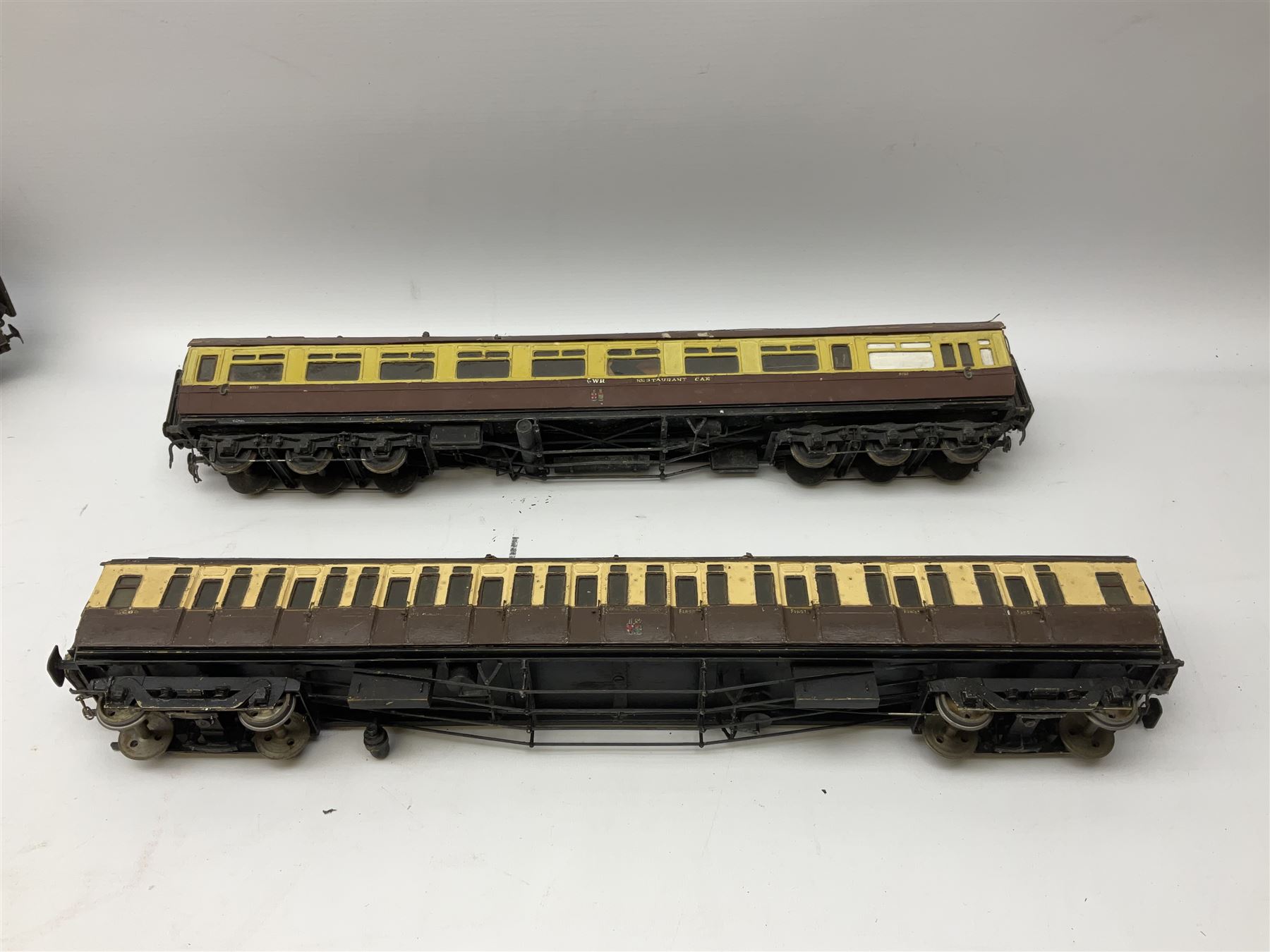 '0' gauge - eight early 20th century scratch-built coaches with GWR livery including three restaurant cars, newspaper van, luggage/guards van etc
