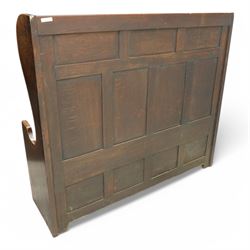 18th century design oak hall bench or settle, tall panelled back decorated with carved arcade, on two shaped end supports, hinged box seat opening to reveal a storage compartment, on a panelled base