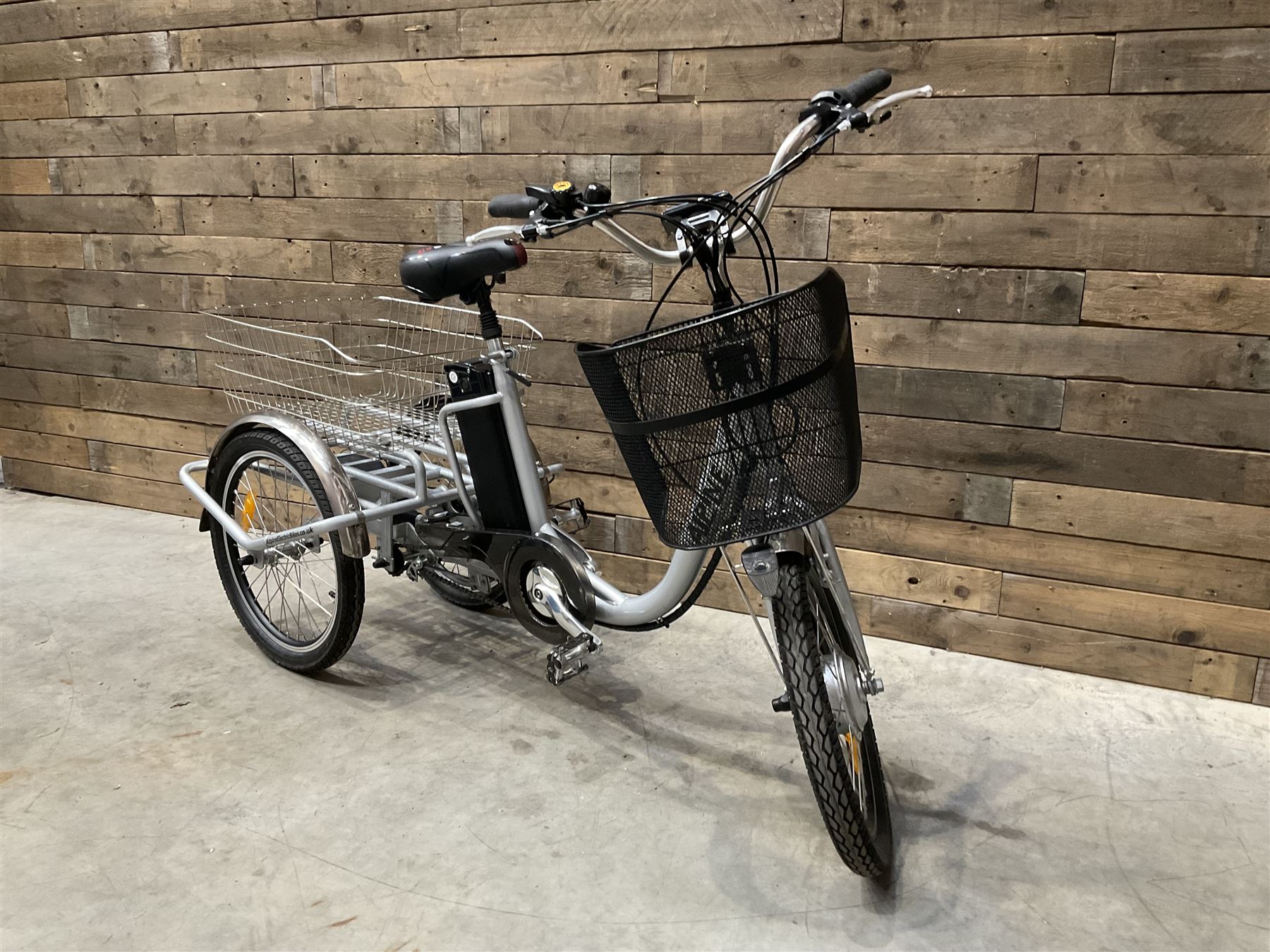 Alpine electric tilt trike - power assisted with throttle (no need to pedal), 15.5mph with 40 mile range, only 37 miles from new, silver finish, removable battery with charger, YoungDo gell seat with cover, £2749 new.