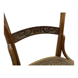 Jacob & Josef Kohn - set of four early 20th century Austrian bentwood chairs, each with carved decoration to the shaped backrest and shaped seat, on splayed supports with stretchers, marked with the manufacturer's stamp and paper label beneath