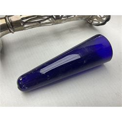 20th century silver specimen vase, of pierced trumpet form with flared rim, filled base, and blue glass liner, hallmarked Birmingham 