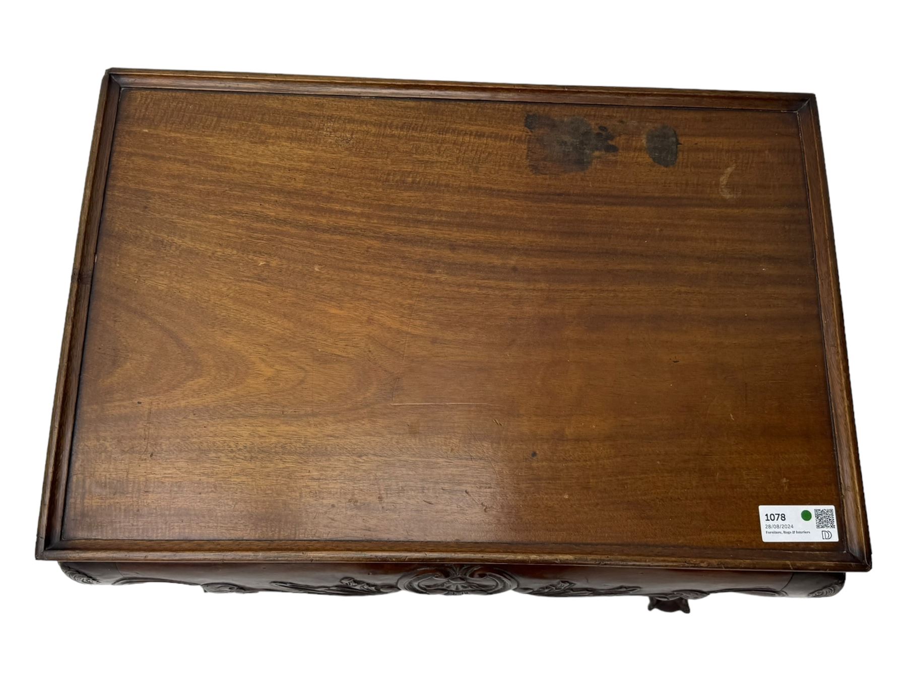 Late 19th to early 20th century mahogany side table, rectangular top with applied raised moulding, curved upper rails carved with C-scroll cartouches and extending curled leaves, bellflower carved cabriole supports with ball and claw feet 