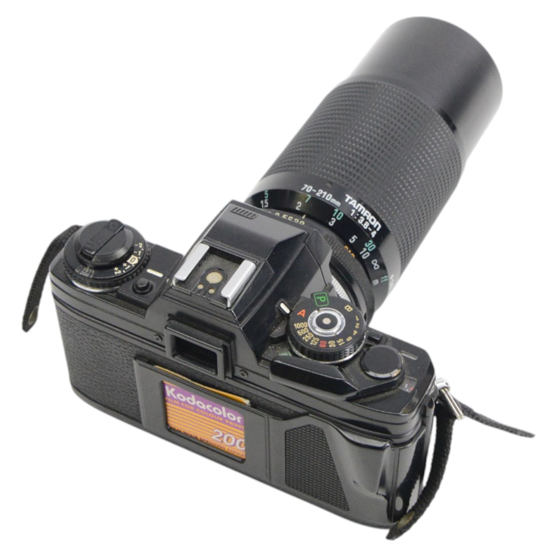 Two Minolta SLR camera bodies, comprising X-300 serial no. 8592491 and X-700 serial no. 1498583, together with five lenses including Sigma Telephoto 1:5.6 f=400mm serial no. 1018435, Vivitar Series 1 28mm 1:1.9 VMC Auto Wide Angle Lens no. 37822044, two Minolta MD 50mm 1:1.7 49mm lens nos. 7177581 & 8384472, Tamron 70-210mm 1:3.8-4 lens no. 8316867 and camera accessories, all within a soft carry case