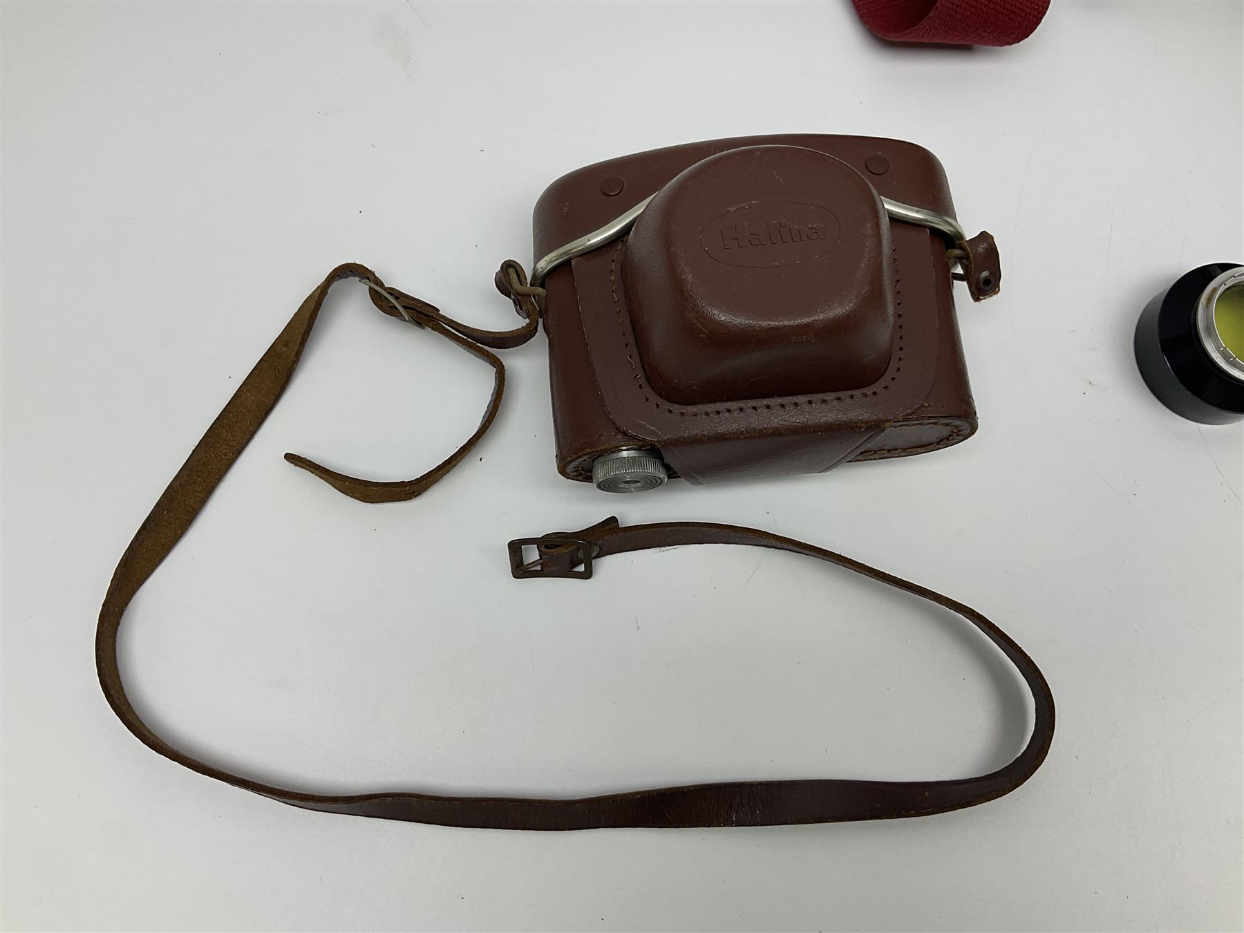 Canon EOS 50e camera body, serial no 8305671 with 'Canon Zoom EF 35-135mm 1:4-5.6' lens together with Halina 35X super camera body, with 'Halina Anastigmat f.c. 1:3.5 f=45mm' lens and other camera equipment 