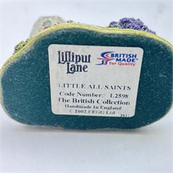 Eighteen Lilliput lanes, including Lundy Lighthouse, Bluebell Wood, St Marys, Winsor Cottage etc, all with original boxes and four limited edition Lilliput Lane prints 