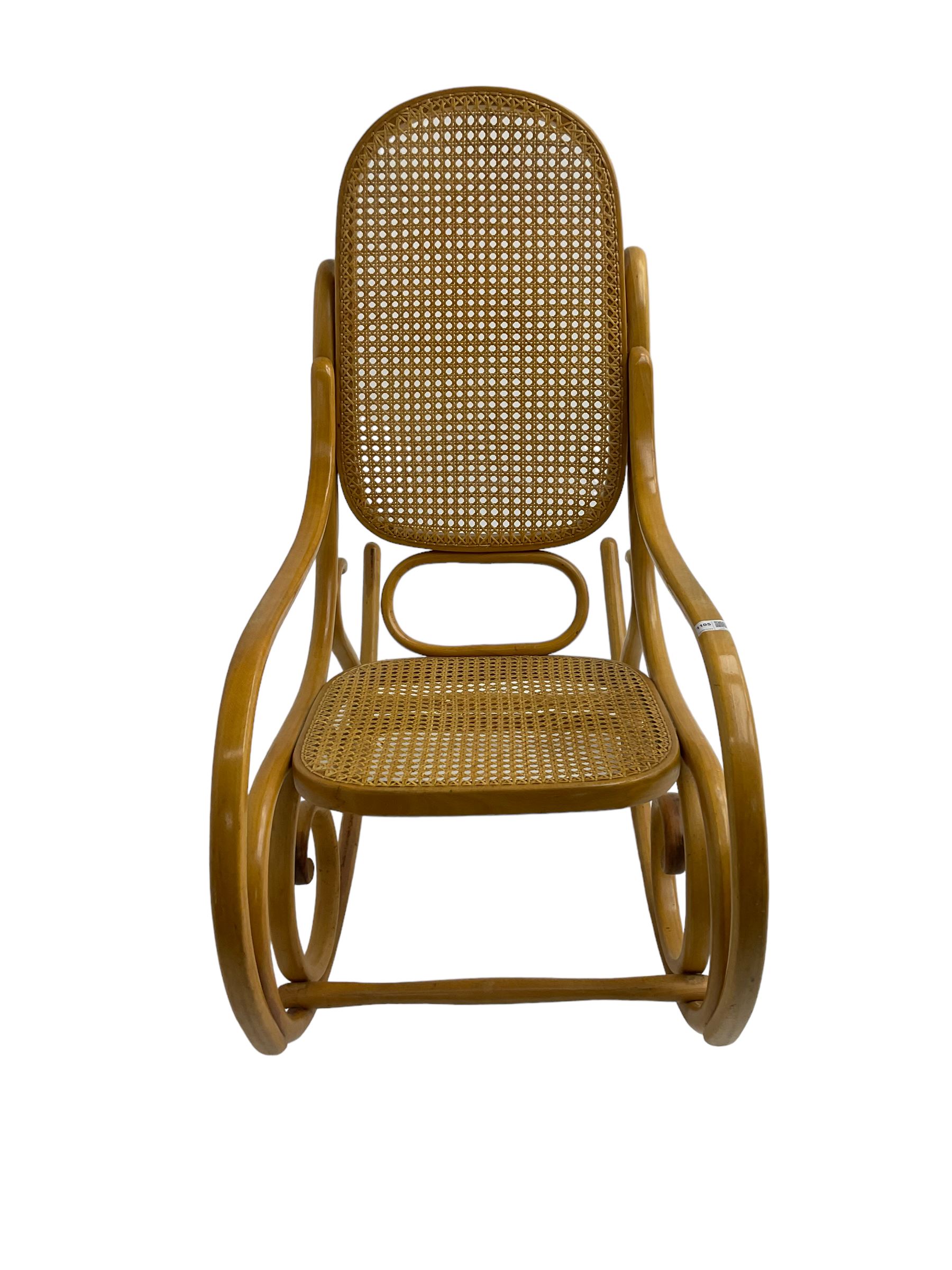 Early to mid-20th century Michael Thonet design bentwood rocking chair, with cane seat and back