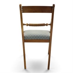 19th century mahogany extending dining table, rectangular top with rounded corners raised on turned and fluted supports with brass cups and castors, with two additional leaves; with set of eight (6+2) Regency design mahogany dining chairs, spiral-reeded back-bar over drop-in seats and sabre supports (W54cm H85cm)