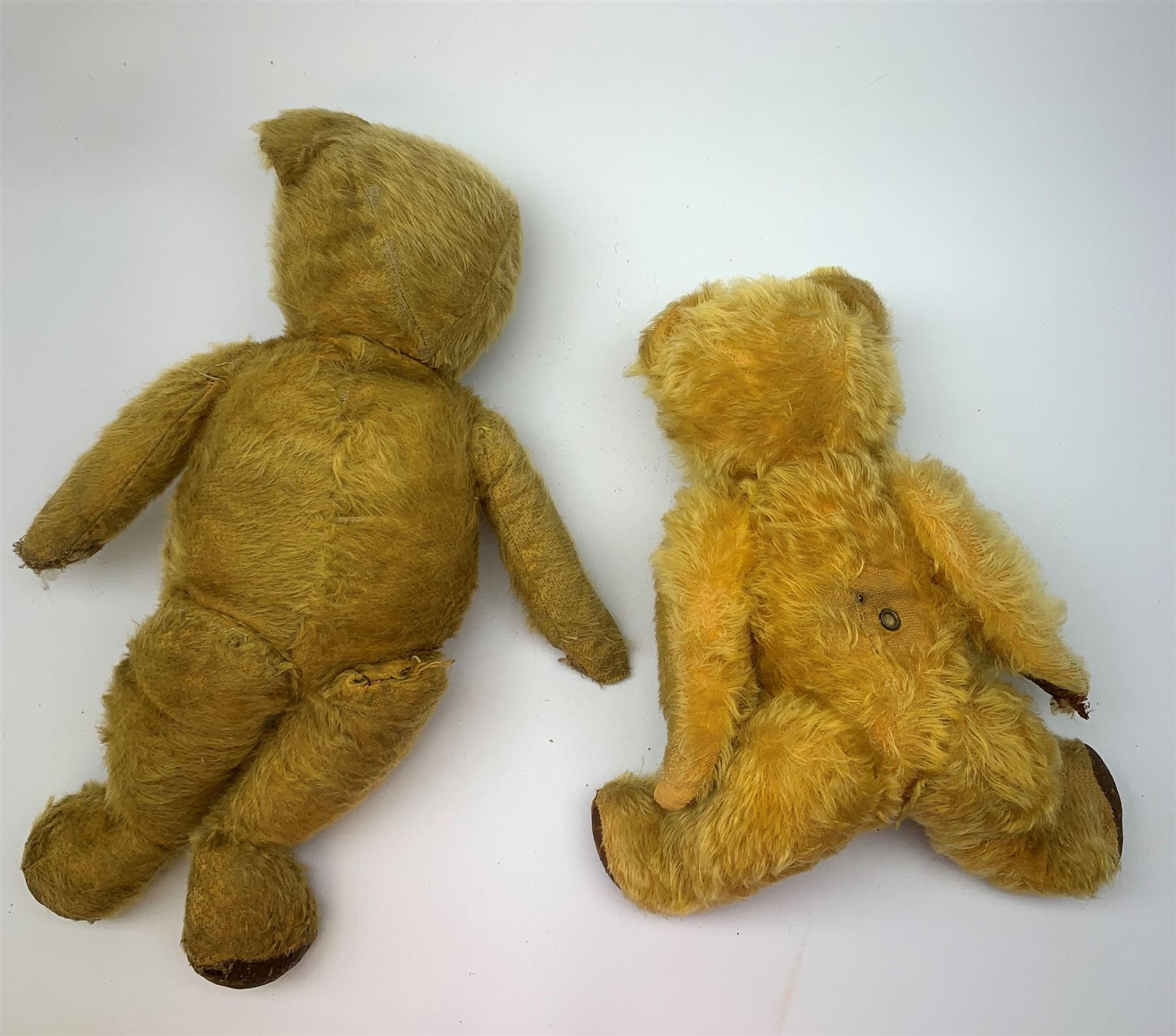 Five British teddy bears 1930s-50s including Irish Tara bear with swivel jointed head, glass eyes, vertically stitched nose and mouth, inoperative musical movement and jointed limbs H15