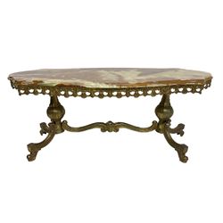Mid-20th century Italian design Onyx and gilt serpentine coffee table, pierced gilt metal frieze with scrolling decoration, raised on twin end supports with globular turning and foliate decoration united by shaped scroll stretcher