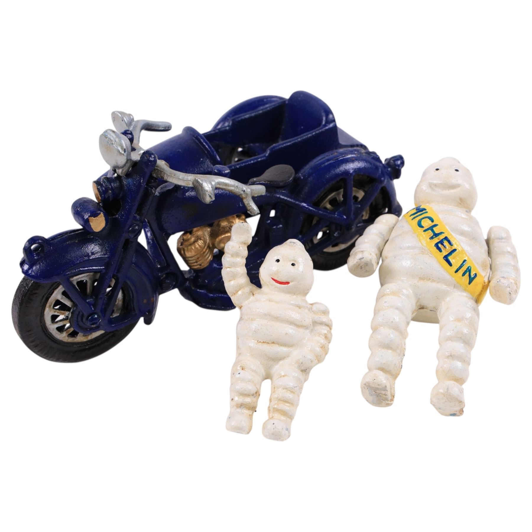Cast iron figure, modelled as a Michelin man upon a motorbike, H18cm