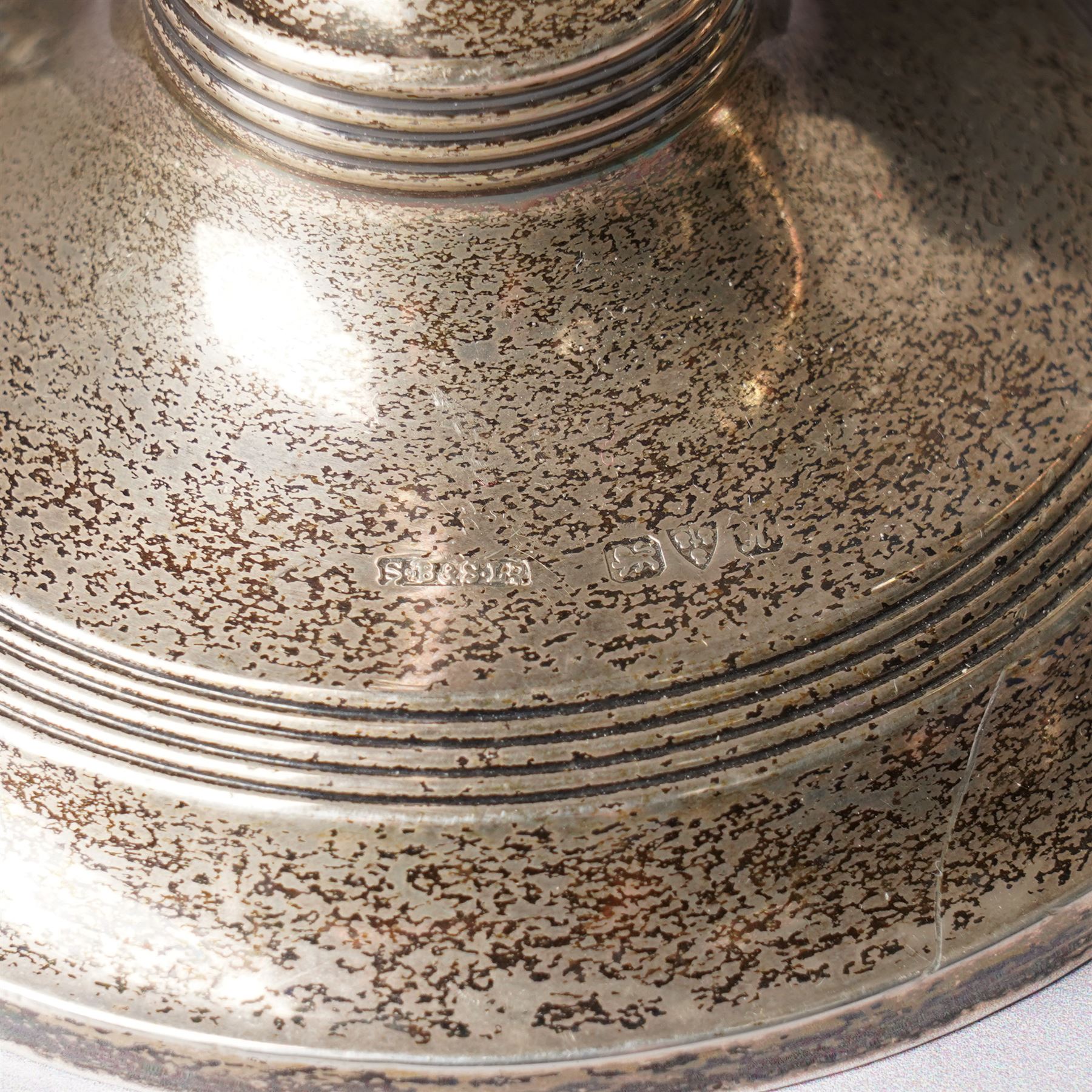 Pair of Edwardian silver candlesticks H16cm Chester 1908 Maker S Blanckensee & Son Ltd and a silver meat skewer/ paper knife, cased Sheffield 1977 Maker Cooper Bros