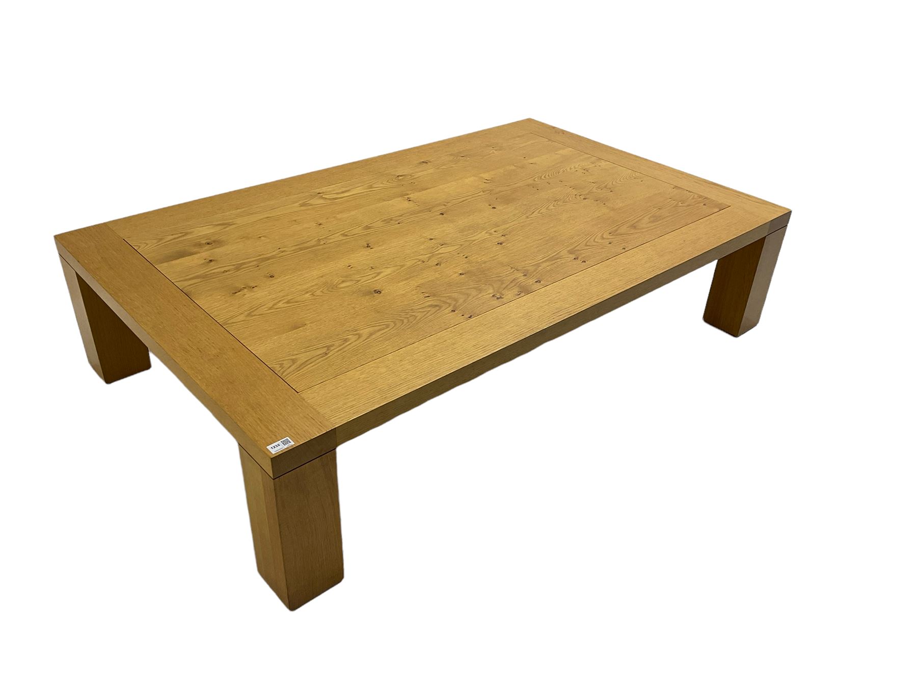 Large pippy oak rectangular coffee table, square block leg, retailed by Chapmans of Newcastle