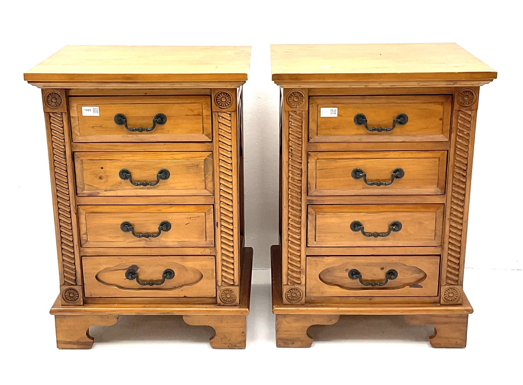 Gothic pine bedside chests, four graduating drawers, rope twist carving, shaped bracket supports 