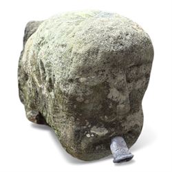 Two large cast stone figures with small lion and face stone pieces