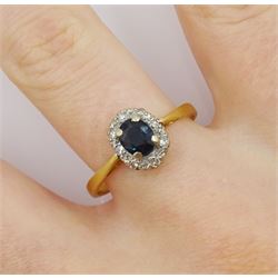 18ct gold oval sapphire and diamond cluster ring, hallmarked 