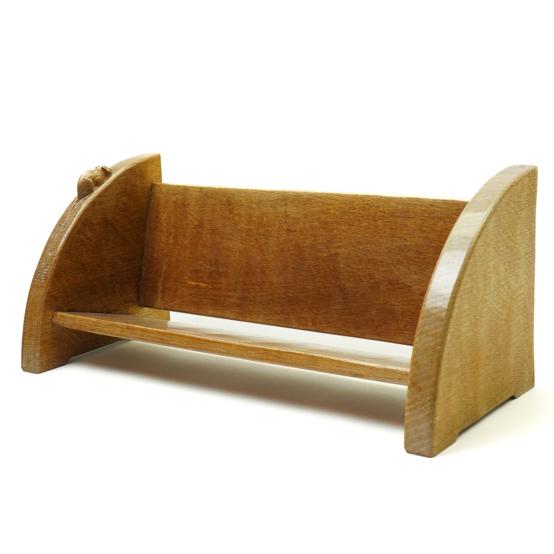Mouseman - oak book trough, curved end supports, with carved mouse signature, by the workshop of Robert Thompson, Kilburn W46cm