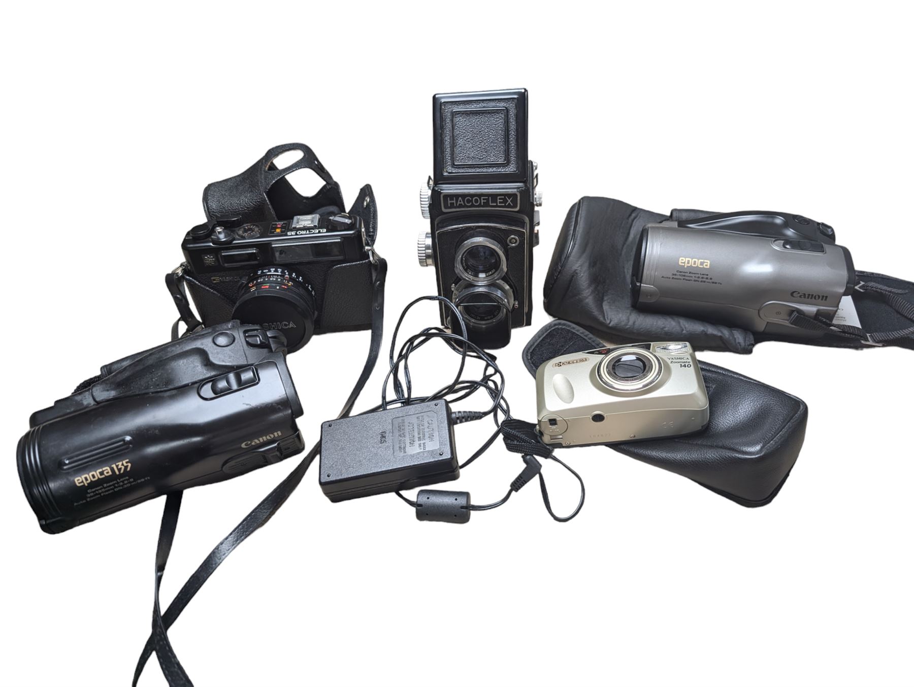 Two Canon Epoca video cameras, a Hacoflex twin lens camera, Yashica Electro 35 camera and a Kyocera Zoomate 140