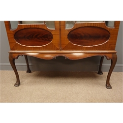  Edwardian mahogany display cabinet, projecting cornice above two astragal glazed doors, with oval figured panels, shaped apron, cabriole supports with ball and claw feet, W116cm, H174cm, D38cm  